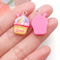 Macro view of resin cupcake charms showing the colorful front and flat back side details - Rose Base Yellow Sweet Milkshake Cake (24527)