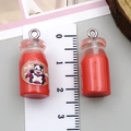 Close-up of DIY resin milk bottle pendant with height scale measurement of 2.5cm - Transparent Red