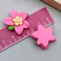Pink resin flower charms with green leaves and yellow centers for DIY jewelry making - Orchid (24347) / Rose Red