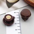 Miniature brown coffee cup and saucer model next to a ruler for size reference - Brown 3D Latte Art Coffee Style