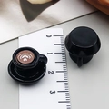 Miniature resin coffee cup pendants with latte art shown next to a ruler for size scale - Black 3D Double Heart Latte Art Style