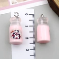 Pink resin milk bottle charm for DIY jewelry making featuring a cute cow print design - Transparent Pink