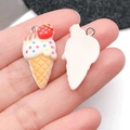 Detailed front and back view of resin strawberry ice cream cone DIY charms with metal rings - White Strawberry Cone (24544)
