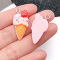 Macro view of handmade pink resin ice cream strawberry pendant with silver metal hook - Pink Strawberry Cone (24546)