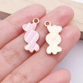 Pink and white striped candy charm pendant in rose gold finish with top hanging loop - Pink Candy Style