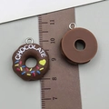 Chocolate donut resin charm with colorful sprinkles and silver hanging ring, 2.2cm diameter - Coffee Brown Resin Round Chocolate Doughnut (23856)