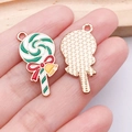 Christmas alloy lollipop charm with colorful enamel inlay and golden metal finish - Green Bow Bell Lollipop (25280)