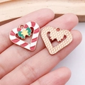 Christmas heart charms with red candy cane enamel and textured rose gold finish - Red Bow Heart Cane (25285)