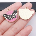 Pink celestial butterfly alloy charm with gold border and brushed metal cat head back - Purple And Black Butterfly (18698)