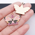 Pink and purple enamel butterfly moth pendant with gold celestial star and moon patterns - Purple Triangle Butterfly (24991)