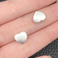 Polished silver heart-shaped metal beads for jewelry making held in palm of hand - Heart Large Hole Bead (8888) / 1 Piece/Pack (10x10mm) / Antique Silver