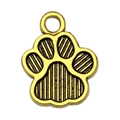 Macro detail of a golden alloy paw print pendant with vertical stripes for DIY jewelry - Striped Paw Style (20604)