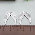 Antique silver wing charms for jewelry making with detailed feather texture and scale - Single Sided Feather Wing (10053)
