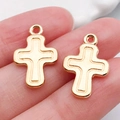 Set of two gold KC finish cross charms held between fingers for DIY jewelry crafting - 1pc Cross 19x13mm (20331)