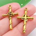 Golden alloy cross pendants with rose relief and vine texture, set of two pieces - Rose Wrapped Cross Style (20376)