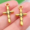 Pair of vintage golden alloy cross pendants with detailed beadwork for jewelry making - Spliced Cross Style (20381)