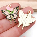 Pendentif papillon émaillé rose et noir avec motif de tulipe et dos doré - Style de Papillon à Motifs (18107)
