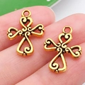 Pair of retro gold-plated alloy hollow cross pendants for DIY jewelry making - Heart Spliced Cross Style (20382)