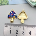 Blue mushroom alloy pendant with colorful polka dots and golden textured back - Blue