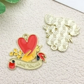 Enameled heart charm with Love You Ma text and golden hand for DIY jewelry - Red Hand Holding Heart (18537)