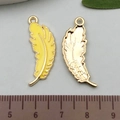 Yellow enamel feather charms with golden finish and detailed back texture - Yellow Feather