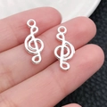 Silberne Notenschlüssel-Anhänger für DIY-Schmuck in kompakter Größe zum Basteln - Mini Musiknote (20918)