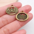 Antique bronze musical note pendant featuring treble clef and hollowed-out oval design - Round Note (20903)