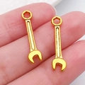 Miniature gold alloy wrench pendants for DIY jewelry making and craft keychains - Wrench 24x6mm (20391)