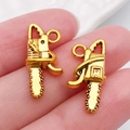 Miniature chainsaw alloy pendants in shiny gold finish for DIY jewelry crafting - Chainsaw 20x10mm (20392)