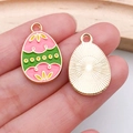 Pink and green enamel Easter egg pendant with floral pattern and golden metal frame - Chick Easter Egg (15142)