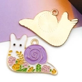 Charming purple snail enamel pendant with floral patterns and a golden metal back - 1 Piece (20x27mm)