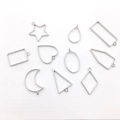 Silver zinc alloy geometric hollow pendants for DIY resin jewelry making in 9 shapes - White K Geometric Frame Set (HK390)