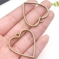 Set of two vintage gold hollow heart-shaped alloy pendant frames for DIY jewelry crafts - Ancient Bronze Heart Frame (10491)