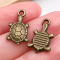 Breloques tortue en bronze antique de style vintage pour la création de bijoux - Style Tortue de Mer (20714)