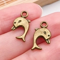 Paire de breloques dauphin en bronze antique pour bijoux DIY sur paume de main - Style Dauphin (20715)