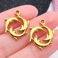Colgantes de delfines dorados en círculo para joyería DIY y accesorios de collar - Delfines en Círculo Oro Antiguo (20736)