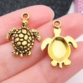 Colgantes de tortuga marina dorados en aleación para creación de joyas DIY - Tortuga Marina Océano Oro Antiguo (20731)