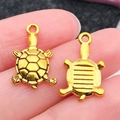 Colgantes de tortuga marina dorada en aleación para creación de joyas DIY y collares - Tortuga Océano Oro Antiguo (20742)