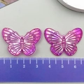 Ciondolo farfalla in resina traslucida viola da 30 mm con trama perlata per gioielli fai da te - Farfalla in Acrilico Cangiante Rosa Rosata