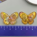 Ciondoli a farfalla in resina con finitura oro ambra iridescente per gioielli fai da te - Farfalla in Acrilico Cangiante Arancione