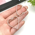 DIY silver heart-shaped zinc alloy open bezels for resin earrings and jewelry making - 30x34mm / White K Heart Shape Frame (10478)