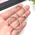 Set of two polished silver oval hollow pendants for DIY jewelry making and resin crafts - 24x39mm / White K Oval Frame (10482)