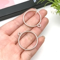 Silver hollow round frame jewelry pendant DIY zinc alloy metal connectors held in hand - 32x28mm / White K Round Frame (22235)