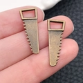 Bronze hand saw metal pendant set for DIY necklaces and keychains tool charms - Antique Bronze Saw (17382)