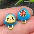 Pendentif porte-bonheur en émail bleu avec finition dorée et caractère de bénédiction - Zongzi Souriant Bleu Grand (22602)
