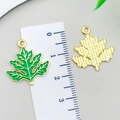 Golden maple leaf pendant with green enamel finish and textured reverse for jewelry DIY - Wormwood Leaf Style (23035)