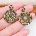 Vintage bronze clock pendant for DIY jewelry with Roman numerals and sunburst pattern - Round Clock Gear Charm (7198)