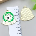 Gold-plated soccer charm with green enamel coating and SOCCER text engraving - Green Rotating Soccer Style (22941)