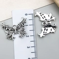 Pendentif papillon en argent antique pour bijoux DIY avec ailes creuses et taille 2,5 cm - Style Papillon Évidé Artisanal Lourd (22312)