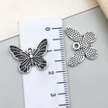 Antique silver hollow butterfly pendant with wing texture and scale measurement - Heavy Craft Butterfly Style (22316) / 18x14mm